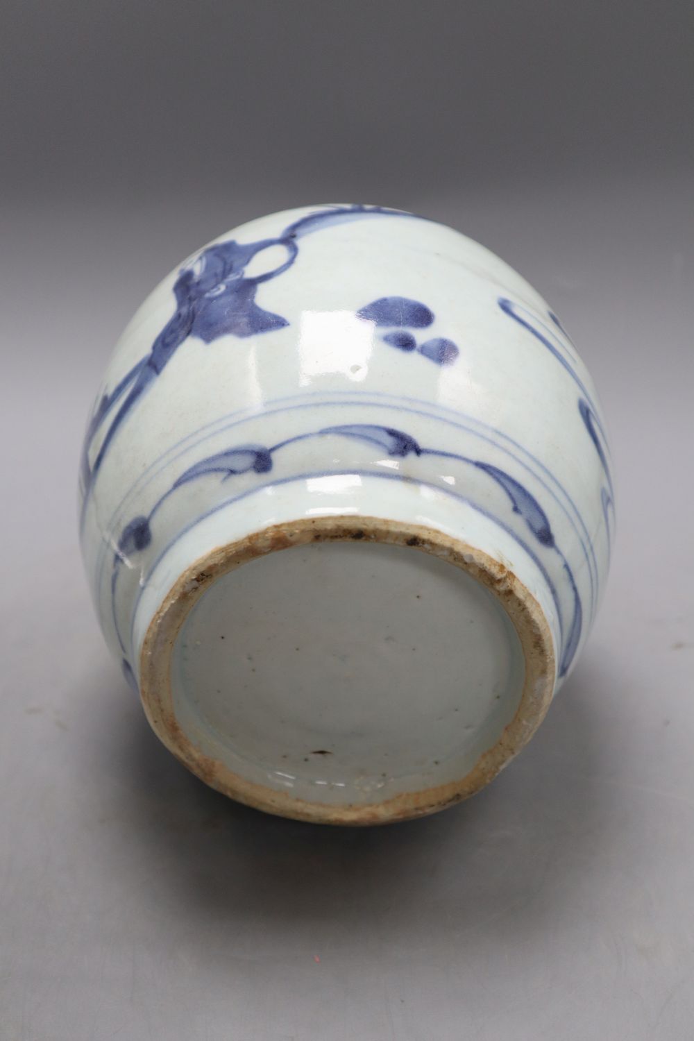 A Chinese Late Ming blue and white landscape jar, height 19cm, with certificate of authenticity, restored rim